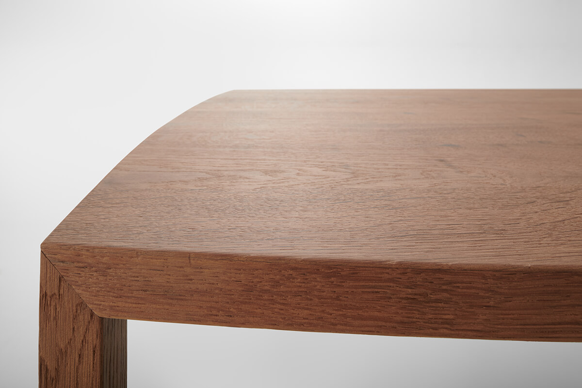 Tense Curve Table ☞ Finishing: Carbonised Wood X094 ☞ Dimensions: 140 x 360 cm